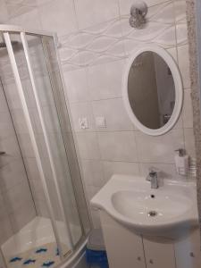 Phòng tắm tại Pokoje Gościnne Pod Wiatrakiem