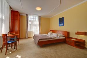 Postel nebo postele na pokoji v ubytování Hotel La Passionaria