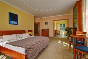 Postel nebo postele na pokoji v ubytování Hotel La Passionaria