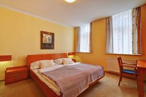 Postel nebo postele na pokoji v ubytování Hotel La Passionaria