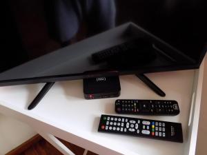 TV a/nebo společenská místnost v ubytování Protea Guest House