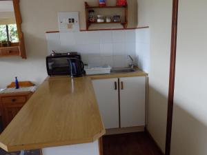 Kuchyň nebo kuchyňský kout v ubytování Protea Guest House