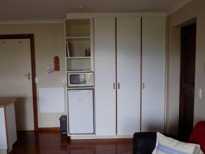 Kuchyň nebo kuchyňský kout v ubytování Protea Guest House