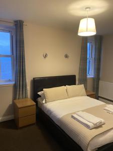 En eller flere senge i et værelse på Hillside Bed & Breakfast Dunbar