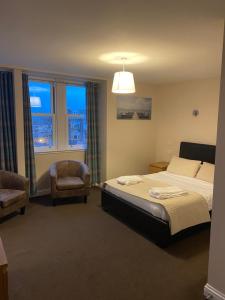 En eller flere senge i et værelse på Hillside Bed & Breakfast Dunbar