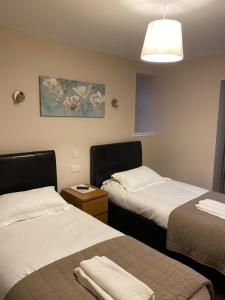 Una cama o camas en una habitación de Hillside Bed & Breakfast Dunbar
