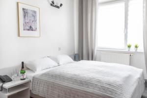 Łóżko lub łóżka w pokoju w obiekcie Hotel Górecki