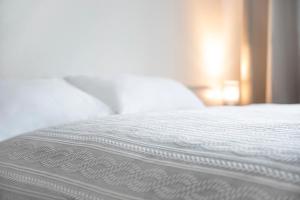 Łóżko lub łóżka w pokoju w obiekcie Hotel Górecki