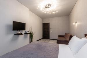 Televízia a/alebo spoločenská miestnosť v ubytovaní 1 и 2х комнатные апартаменты у Парка Краснодар жк Панорама