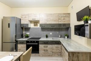 Nhà bếp/bếp nhỏ tại 1 и 2х комнатные апартаменты у Парка Краснодар жк Панорама