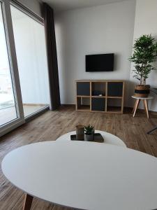 TV a/nebo společenská místnost v ubytování Grand Palace