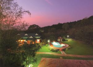 Utsikt över poolen vid Eco Garden Resort & Heritage Cheruthuruthy Thrissur eller i närheten