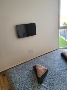 TV a/nebo společenská místnost v ubytování Grand Palace