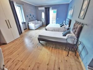 Posteľ alebo postele v izbe v ubytovaní Le Giare B&B