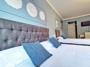 Posteľ alebo postele v izbe v ubytovaní Le Giare B&B