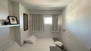 Łóżko lub łóżka w pokoju w obiekcie Cielomar Benalmadena costa