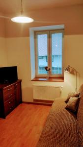Postel nebo postele na pokoji v ubytování Apartmán Viky, Karlovice 251, 79323 Karlovice
