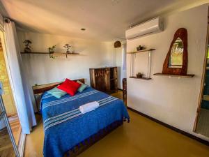 Кровать или кровати в номере Shaka House