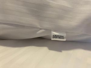 Posteľ alebo postele v izbe v ubytovaní Dom Gościnny Grzęda