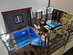 an aerial view of a house with a blue couch at Casa Los Islas in Playa del Ingles