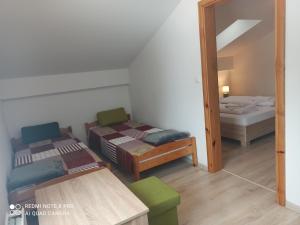 Postel nebo postele na pokoji v ubytování Penzion Réva
