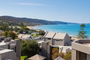 
a large building with a view of the ocean at Cumberland Lorne Resort in Lorne
