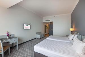 Katil atau katil-katil dalam bilik di Bayview Hotel Langkawi