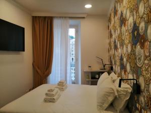 TV a/nebo společenská místnost v ubytování Hotel Cinquantatre
