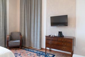 TV a/nebo společenská místnost v ubytování Residence Sferisterio
