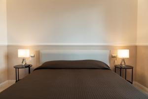 Postel nebo postele na pokoji v ubytování Residence Sferisterio