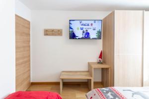 Televízia a/alebo spoločenská miestnosť v ubytovaní Apartment Sabrina