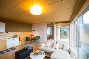 Posezení v ubytování Südalpen Lofts