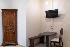 TV a/nebo společenská místnost v ubytování Residence Sferisterio