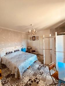Een bed of bedden in een kamer bij La Bouchère 33