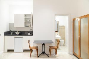 Kuchyň nebo kuchyňský kout v ubytování Residence Sferisterio