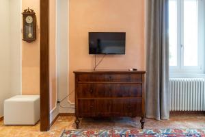 TV a/nebo společenská místnost v ubytování Residence Sferisterio