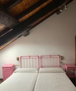 A bed or beds in a room at Casa Goris
