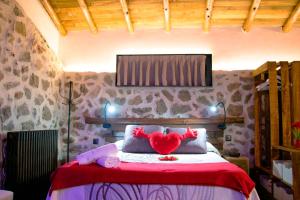 Postel nebo postele na pokoji v ubytování Casa Rural El Cuco