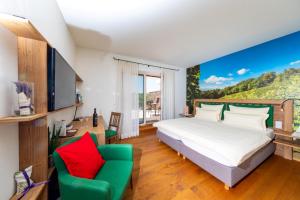 TV a/nebo společenská místnost v ubytování Weingut und Gästezimmer Perner