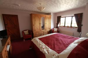 Letto o letti in una camera di Pointers Guest House