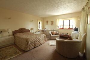 Letto o letti in una camera di Pointers Guest House