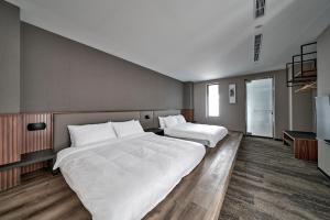 Letto o letti in una camera di Yen Hotspring