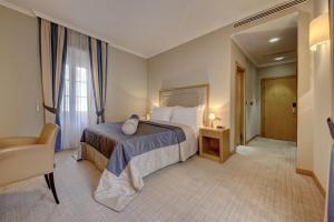 Cama o camas de una habitación en Hotel Vardar