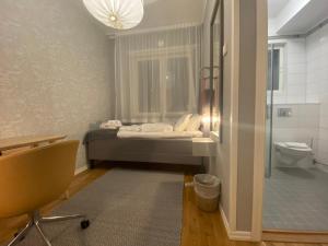 Baðherbergi á Turinge Hotel