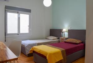 Posteľ alebo postele v izbe v ubytovaní Upscale Modern Escape in the Historic Center
