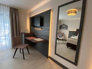 TV a/nebo společenská místnost v ubytování Hotel Ritter Badenweiler