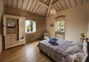 Katil atau katil-katil dalam bilik di Villa Chianti - Homelike Villas
