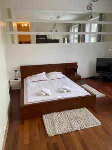 Posteľ alebo postele v izbe v ubytovaní apartament centrum