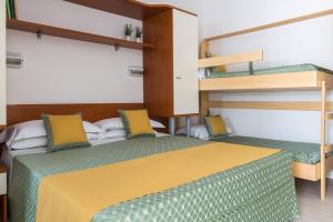 Postel nebo postele na pokoji v ubytování Hotel Principe
