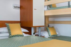 Postel nebo postele na pokoji v ubytování Hotel Principe